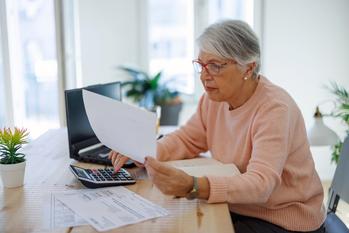Median Net Worth Among Older Americans Is Surprisingly Low. Here's How You Can Do Better.: https://g.foolcdn.com/editorial/images/761712/senior-woman-calculator-documents-gettyimages-1399367528.jpg