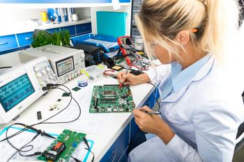 Want to Invest in the Semiconductor Industry but Don't Know How? Try This ETF.: https://g.foolcdn.com/editorial/images/720775/person-working-on-circuit-board.jpg