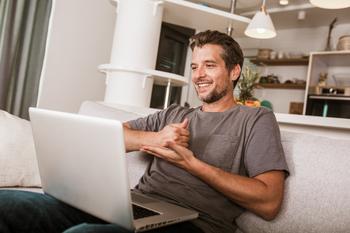 2 Healthcare Stocks You Can Buy and Hold for the Next Decade: https://g.foolcdn.com/editorial/images/721019/getty-happy-person-sign-language-laptop.jpg