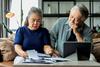 3 Ways You Could Be Leaving Some of Your Social Security Benefits on the Table: https://g.foolcdn.com/editorial/images/782442/stressed-couple-looking-at-documents-together.jpg