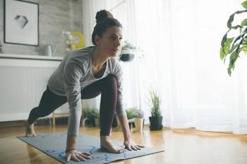 1 Number You Missed From Lululemon's Monster Quarter: https://g.foolcdn.com/editorial/images/727529/yoga-at-home.jpg