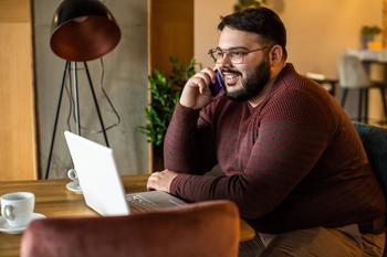 A Once-in-a-Generation Investment Opportunity: 1 Artificial Intelligence (AI) Growth Stock to Buy Hand Over Fist: https://g.foolcdn.com/editorial/images/773197/gettyimages-man-smiles-on-phone-at-computer.jpg