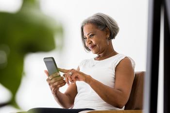 My Cousin Eased Her Way Into Retirement, and It Was the Best Thing She Could've Done: https://g.foolcdn.com/editorial/images/771212/older-woman-phone-smile-facetime-app-1.jpg