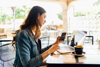 Got $100 Per Week? How the Stock Market Could Turn It Into $790,000: https://g.foolcdn.com/editorial/images/746469/person-sitting-at-a-desk-looking-at-laptop-and-phone.jpg