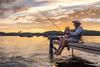 Retired? 5 Stocks Yielding 5% to Buy in 2023: https://g.foolcdn.com/editorial/images/710789/grandfather-and-grandson-fishing-at-sunset.jpg