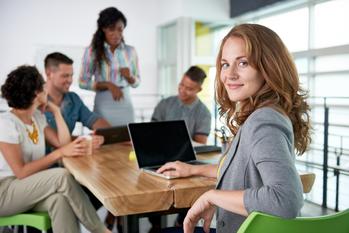 A Solid Growth Stock That Not Enough People Are Talking About: https://g.foolcdn.com/editorial/images/784395/young-businesswoman-with-laptop-in-meeting-smiling.jpg