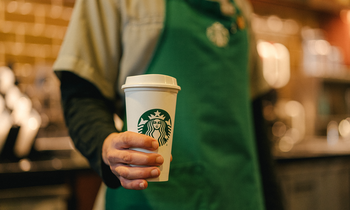 Starbucks' New Superstar CEO Just Released His Plan to Fix the Business. Here's What Investors Need to Know.: https://g.foolcdn.com/editorial/images/790363/starbucks_employee_holding_cup_with_logo_sbux.png