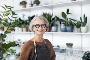 Should You Keep Working After Taking Social Security? It Depends on This 1 Factor: https://g.foolcdn.com/editorial/images/761287/person-smiling-in-a-flower-shop.jpg