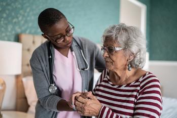 Could This Issue Sink Johnson & Johnson's Stock Price?: https://g.foolcdn.com/editorial/images/746762/doctor-holding-elderly-patients-hand.jpg