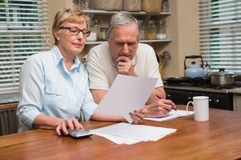 Claiming Social Security Spousal Benefits? Here's 1 Mistake You'll Definitely Want to Avoid: https://g.foolcdn.com/editorial/images/746336/senior-couple-looking-at-document-gettyimages-526980197.jpg