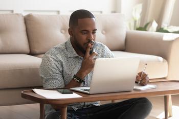 Looking to Pay Off the Average $37,720 in Federal Student Loan Debt? 3 Budgeting Tips That Can Help: https://g.foolcdn.com/editorial/images/750630/concentrated-person-staring-at-computer.jpg