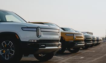 Why Rivian Automotive Stock Hit a Pothole Today: https://g.foolcdn.com/editorial/images/760049/line-of-rivian-trucks-in-a-parking-lot-is-rivn.jpg