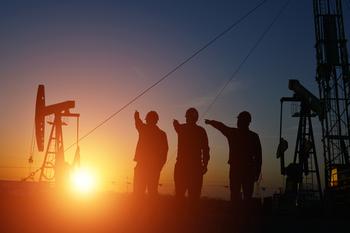 2 Top Oil Stocks to Buy Amid Crude Oil's Slump to $70 a Barrel: https://g.foolcdn.com/editorial/images/791838/people-near-an-oil-well-with-the-sun-rising-in-the-background.jpg