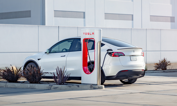 3 Things You Need to Know If You're Considering Buying Tesla Stock Today: https://g.foolcdn.com/editorial/images/771874/tesla-car-at-super-charger-station-1.png