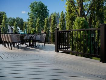 Trex Adds Two New Hues With Enhanced Performance to Trex Enhance® Decking Line: https://mms.businesswire.com/media/20240904006750/en/2231503/5/enh-suburban-multilevel-003-tp-enh-railing-cb-dining-table-2048x2048_%28002%29.jpg