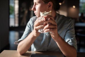 Is Chipotle Stock Still Worth Owning Under New Leadership?: https://g.foolcdn.com/editorial/images/790435/customer-looks-on-while-eating-burrito.jpg