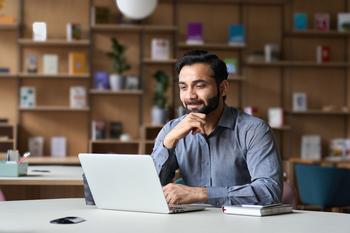 Want to Build Wealth in the Stock Market With Next to No Effort? Start With This Index Fund: https://g.foolcdn.com/editorial/images/768371/person-sitting-at-a-desk-looking-at-a-laptop-and-smiling.jpg