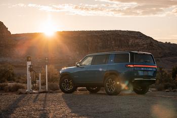 Rivian Is Making a Big Move, but Should Investors Follow in 2024?: https://g.foolcdn.com/editorial/images/758027/2022-rivian-r1s-07.jpg