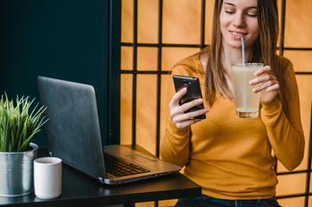 These 2 Stocks Have Plenty of Room to Run: https://g.foolcdn.com/editorial/images/752793/woman-drinking-lemonade-on-phone.jpg