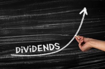 With Another Big Boost, Is It Time to Buy This Supercharged Dividend Stock?: https://g.foolcdn.com/editorial/images/717734/the-word-dividends-on-a-chalkboard-with-a-person-drawing-an-upward-arrow.jpg