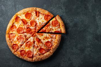 1 Wall Street Analyst Thinks Domino's Pizza Stock Is Going to $526. Is It a Buy Around $445?: https://g.foolcdn.com/editorial/images/767054/pepperoni-pizza-whole-one-slice.jpg