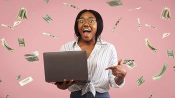 This 1 Simple ETF Could Turn $100 a Month Into $45,000: https://g.foolcdn.com/editorial/images/780748/young-woman-celebrating-in-a-shower-of-cash.jpg