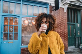 3 New Reasons to Like Dutch Bros Stock: https://g.foolcdn.com/editorial/images/754530/woman-drinking-coffee-shop-hot-chocolate-cold-winter.jpg