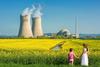 Why Cameco, Ur-Energy, Uranium Royalty, and Uranium Energy Stocks Are Soaring Today: https://g.foolcdn.com/editorial/images/788330/mother-and-son-hold-hands-in-a-field-of-flowers-outside-a-nuclear-power-station.jpg