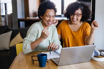 3 Things You Need to Know If You Buy PayPal Stock Today: https://g.foolcdn.com/editorial/images/756960/two-people-looking-at-a-computer-and-smiling.jpg