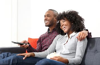 4 Reasons to Buy Netflix Stock, and 1 Reason to Sell: https://g.foolcdn.com/editorial/images/734243/couple-tv-couch.jpg