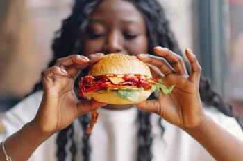 Like McDonald's Stock? Why This Burger Rival Has More Upside for Investors: https://g.foolcdn.com/editorial/images/770769/woman-eating-cheeseburger.jpg