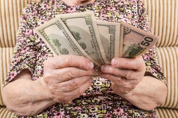 How Much Do You Get a Month for Social Security? Here's a Breakdown of Average Retired-Worker Benefits From Ages 62 Through 99: https://g.foolcdn.com/editorial/images/780934/senior-woman-holding-cash-money-bills-social-security-cola-retirement-getty.jpg