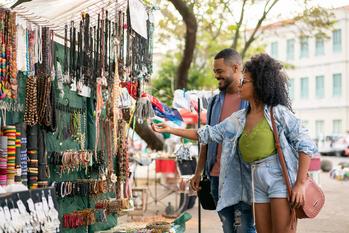 StoneCo: Buy, Sell, or Hold?: https://g.foolcdn.com/editorial/images/766094/two-people-shop-at-outdoor-market-for-handcrafted-items-getty-2022.jpg