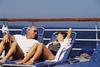 Here's Why Carnival's Stock Price Is Still in Purgatory: https://g.foolcdn.com/editorial/images/761412/24_01_16-a-couple-sitting-on-the-deck-of-a-cruise-ship-_mf-dload-_gettyimages-78458446-1200x800-5b2df79.jpg