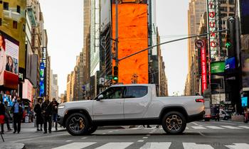 What's Going On With Rivian Stock?: https://g.foolcdn.com/editorial/images/767307/truck-in-middle-of-time-square_rivian.jpg