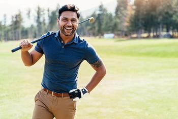 Many Americans Hope or Expect to Live Long Lives, but They're Not Retiring Later. What Can Go Wrong?: https://g.foolcdn.com/editorial/images/781258/getty-smiling-golfer-on-course-blue-shirt.jpg