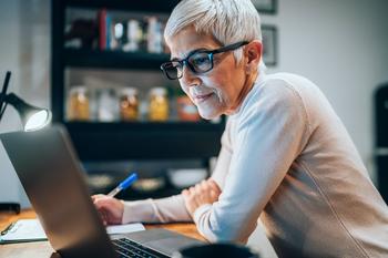 Can You Get the Max Social Security Benefit When Claiming Early at 62?: https://g.foolcdn.com/editorial/images/692072/senior-writing-note-and-looking-at-laptop.jpg