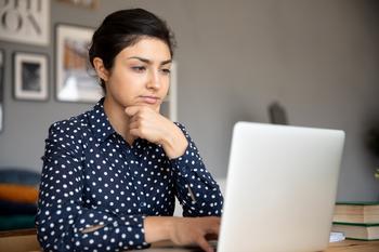 The Unfortunate Truth About Maxing Out Your 401(k): https://g.foolcdn.com/editorial/images/783279/serious-person-with-hand-on-chin-looking-at-laptop.jpg