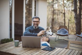 3 Savvy Medicare Moves That Could Slash Your Healthcare Costs in Retirement: https://g.foolcdn.com/editorial/images/784483/older-man-at-laptop-with-dog_gettyimages-1214136074.jpg