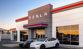 The Ultimate EV Stock to Buy With $1,000 Today: https://g.foolcdn.com/editorial/images/769972/tesla-building-with-tesla-logo-and-two-teslas-in-front.png