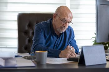 Make These 3 Moves the Month Before You Retire: https://g.foolcdn.com/editorial/images/770360/man-60s-at-deskgettyimages-1471388881.jpg