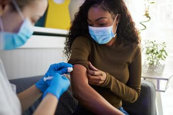 Is Moderna Stock a Buy Now After the U.K.'s Omicron Vaccine Approval?: https://g.foolcdn.com/editorial/images/696424/vaccine-gettyimages-woman-gets-a-vaccine.jpg