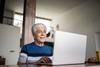 3 Reasons to Claim Social Security Before Age 65: https://g.foolcdn.com/editorial/images/740761/senior-laptop-smiling-gettyimages-1390898592.jpg