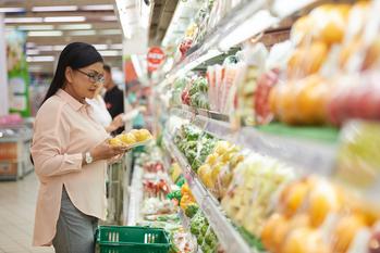 2 Reasons the Smartest Investors Are Watching This Stock, Dubbed the "Amazon of Korea": https://g.foolcdn.com/editorial/images/773387/mature-senior-woman-in-grocery-store-looking-at-produce-poc.jpg