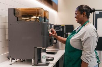 Starbucks' Dividend Yield Is Near an All-Time High. Should You Buy the Stock?: https://g.foolcdn.com/editorial/images/707112/starbucks-investor-day-2022-tryer-center-future-store.jpg