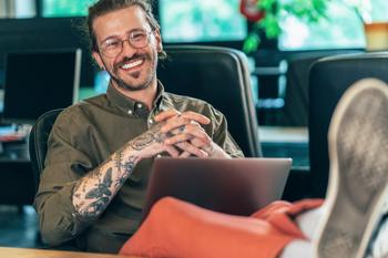 3 Top Stocks to Buy for the Long Haul: https://g.foolcdn.com/editorial/images/759642/getty-happy-feet-on-desk-smiling-tattoos.jpg