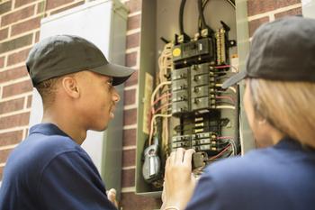 You Don't Have to Pick a Winner in Utilities. Here's Why.: https://g.foolcdn.com/editorial/images/739302/21_05_24-two-people-working-with-a-electric-power-box-_gettyimages-528965736.jpg