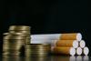 Where Will British American Tobacco Be in 5 Years?: https://g.foolcdn.com/editorial/images/780478/24_04_11-a-pile-of-coins-next-to-a-bunch-of-cigarettes-_mf-dload-gettyimages-1352663466-1201x800-5b2df79.jpg