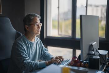 You Need to Plan for an Early Retirement -- Even If You Don't Actually Want One: https://g.foolcdn.com/editorial/images/771315/man-50s-computer-gettyimages-1402880815.jpg