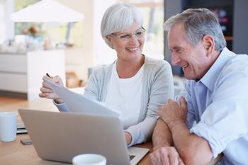 This Social Security Strategy Could Be the Best One for Spouses: https://g.foolcdn.com/editorial/images/769600/senior-couple-smiling-laptop-gettyimages-495809094.jpg